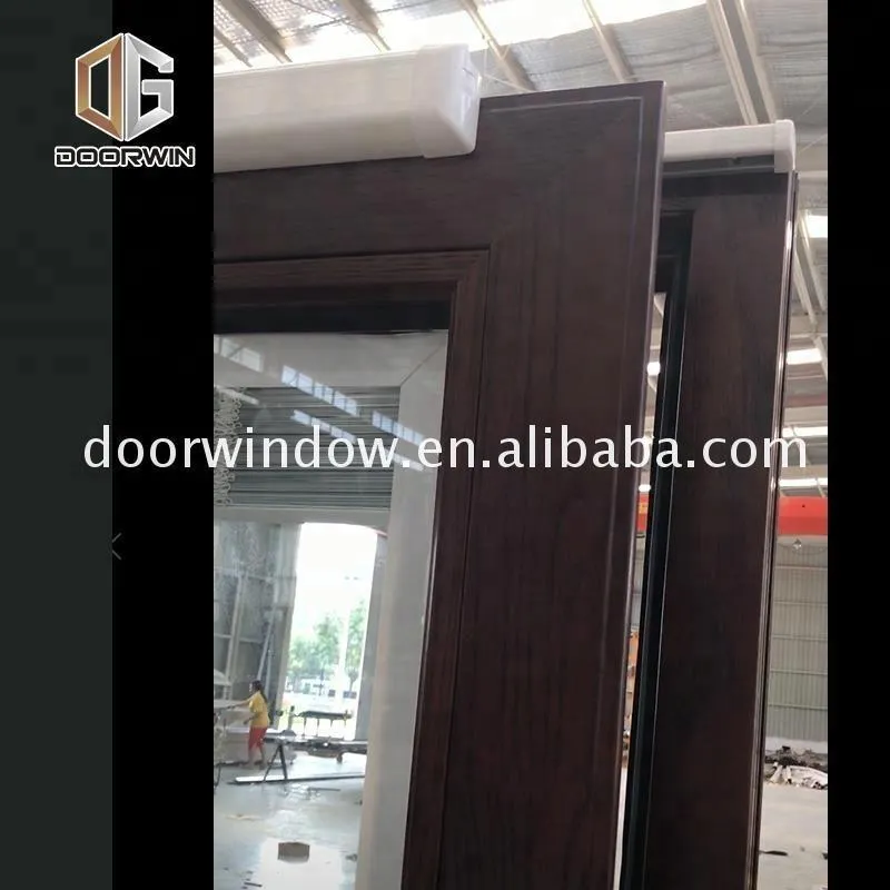 DOORWIN 2021Sliding garage doors with stainless steel net mosquito by Doorwin on Alibaba