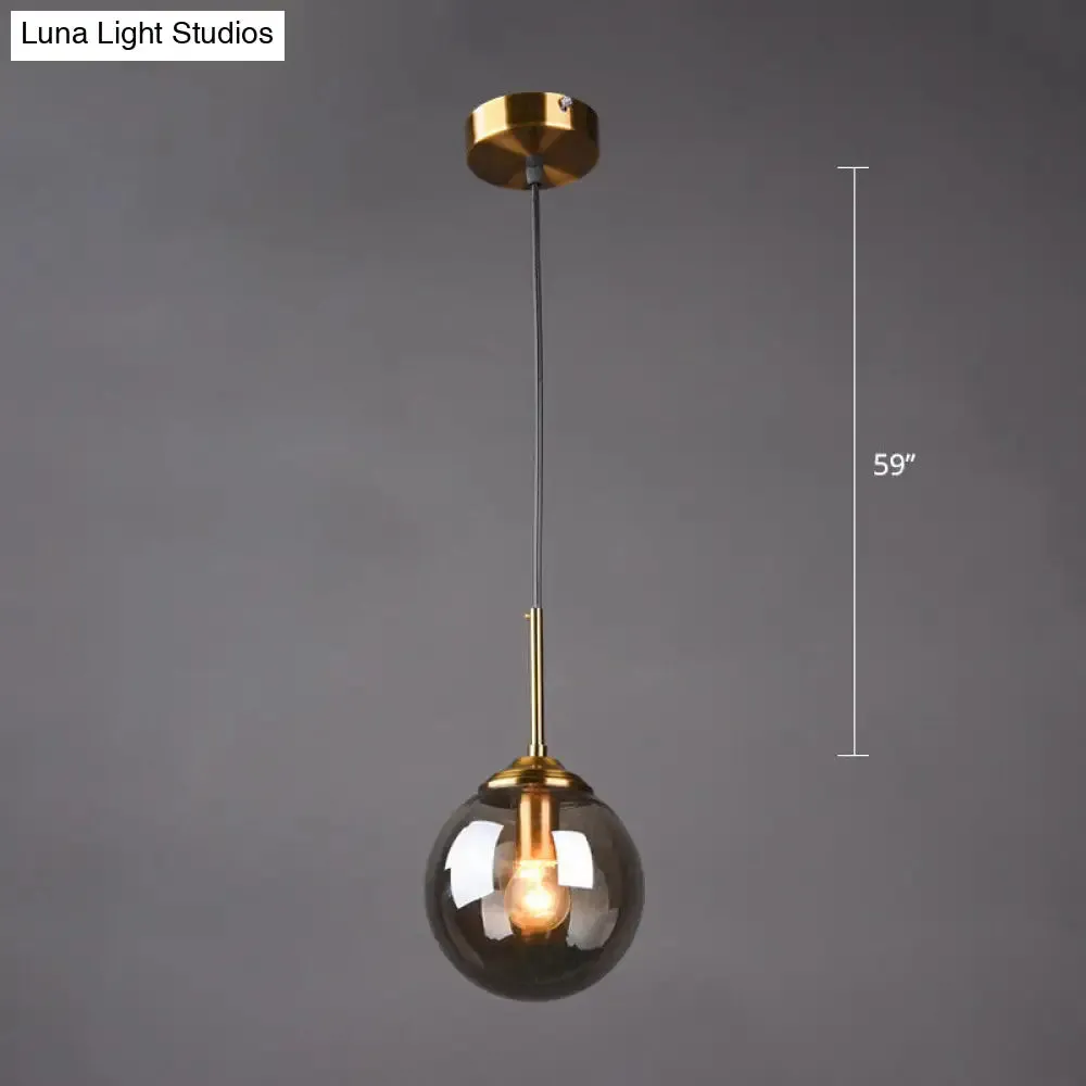 Postmodern Glass Pendant Light: Sphere Drop Design with Bedside & Ceiling Mounts - Brass Finish