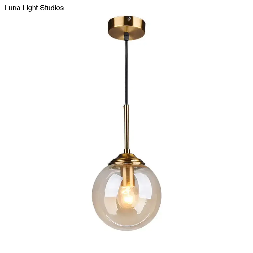 Postmodern Glass Pendant Light: Sphere Drop Design with Bedside & Ceiling Mounts - Brass Finish